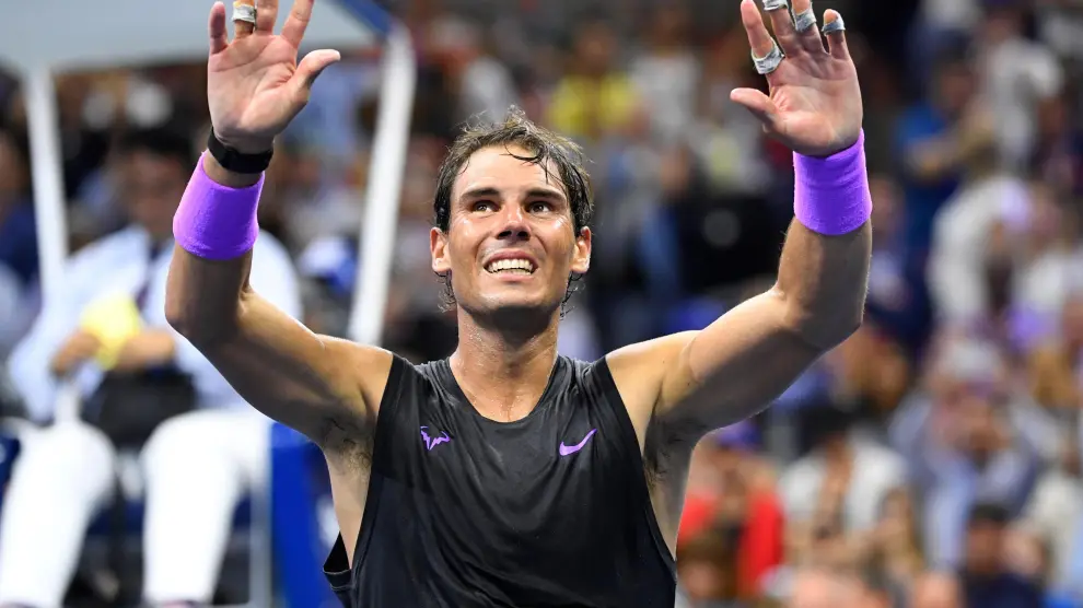 Sep 8, 2019; Flushing, NY, USA; Rafael Nadal of Spain celebrates match point against Daniil Medvedev of Russia in the men's singles final on day fourteen of the 2019 US Open tennis tournament at USTA Billie Jean King National Tennis Center. Mandatory Credit: Danielle Parhizkaran-USA TODAY Sports [[[REUTERS VOCENTO]]] TENNIS/
