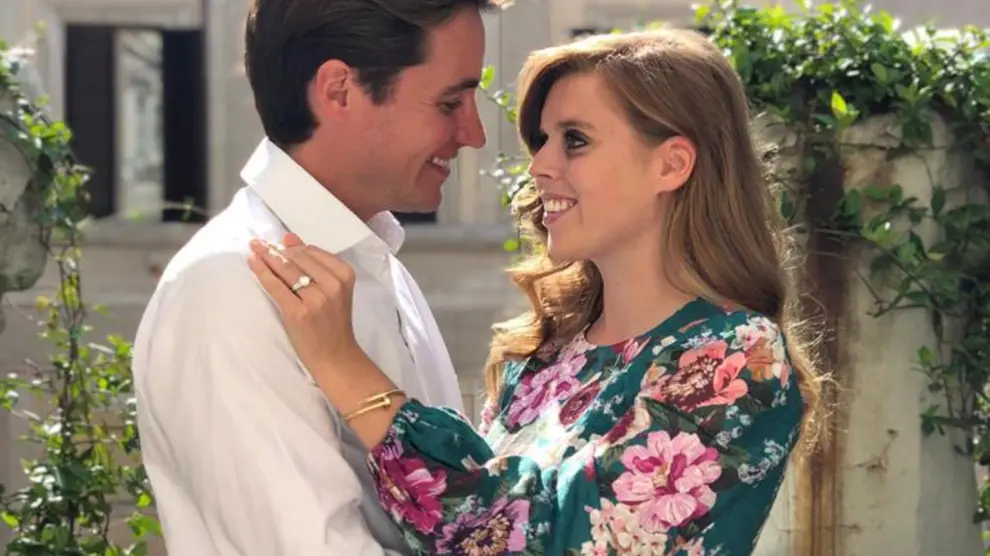 Undated picture released by Buckingham Palace shows Princess Beatrice and Edoardo Mapelli Mozzi in Italy, whose engagement has been announced today, in this handout obtained by Reuters on September 26, 2019. Princess Eugenie/Handout via REUTERS ATTENTION EDITORS - THIS IMAGE WAS PROVIDED BY A THIRD PARTY. NO RESALES. NO ARCHIVES. EDITORIAL USE ONLY. MANDATORY CREDIT. NO COMMERCIAL OR BOOK SALES. NO COMMERCIAL USE (including any use in merchandising, advertising or any other non-editorial use including, for example, calendars, books and supplements). NOT FOR USE AFTER 26 OCTOBER, 2019. The photograph must not be digitally enhanced, manipulated or modified in any manner or form and must include all of the individuals in the photograph when published. All other requests for use should be directed in writing to the Press Office at Buckingham Palace. This handout photo may only be used in for editorial reporting purposes for the contemporaneous illustration of events, things or the people i