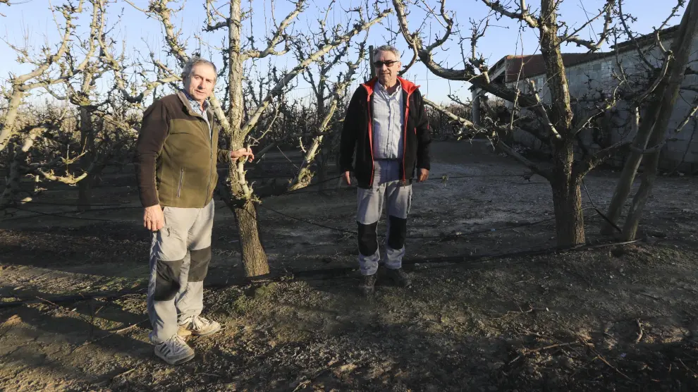 Manuel Rausa y José Peralta, agricultores de Fraga.