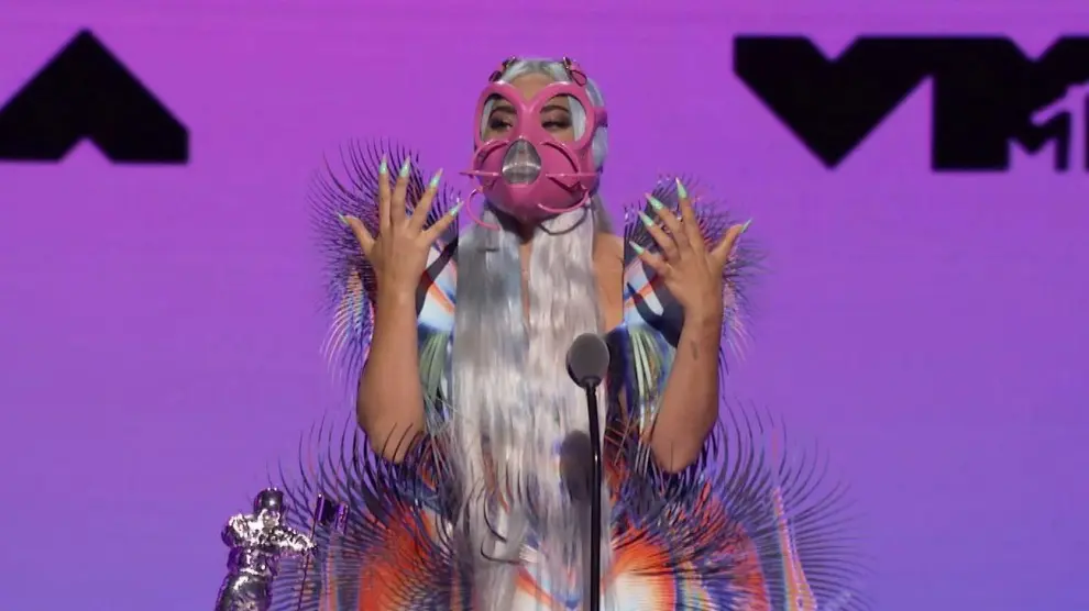 Lady Gaga accepts the award for Best Collaboration for "Rain On Me" during the 2020 MTV VMAs in this screen grab image made available on August 30, 2020. VIACOM/Handout via REUTERS   ATTENTION EDITORS - THIS IMAGE HAS BEEN SUPPLIED BY A THIRD PARTY. NO RESALES. NO ARCHIVES. [[[REUTERS VOCENTO]]] AWARDS-VMA/