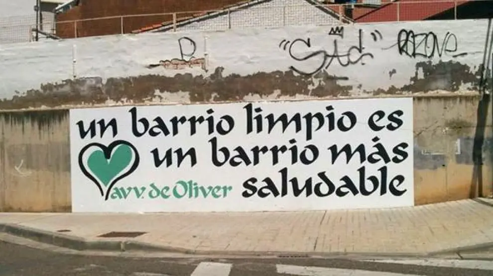 Una de las pintadas realizadas en el barrio Oliver durante la campaña de concienciación de 2015