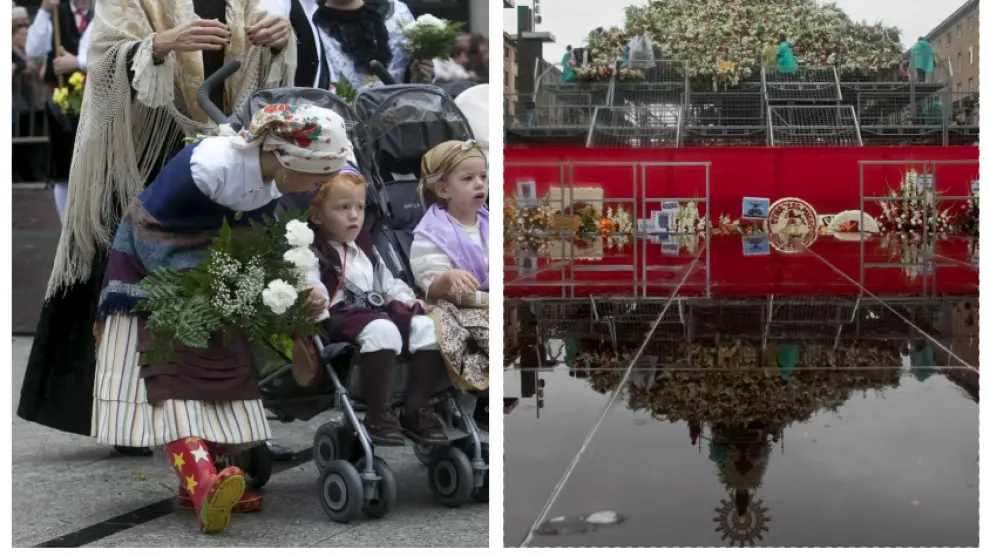 A la izquierda, una niña con botas de agua. A la derecha, la Ofrenda de Flores a la Virgen reflejada en un gran charco en la plaza del Pilar.