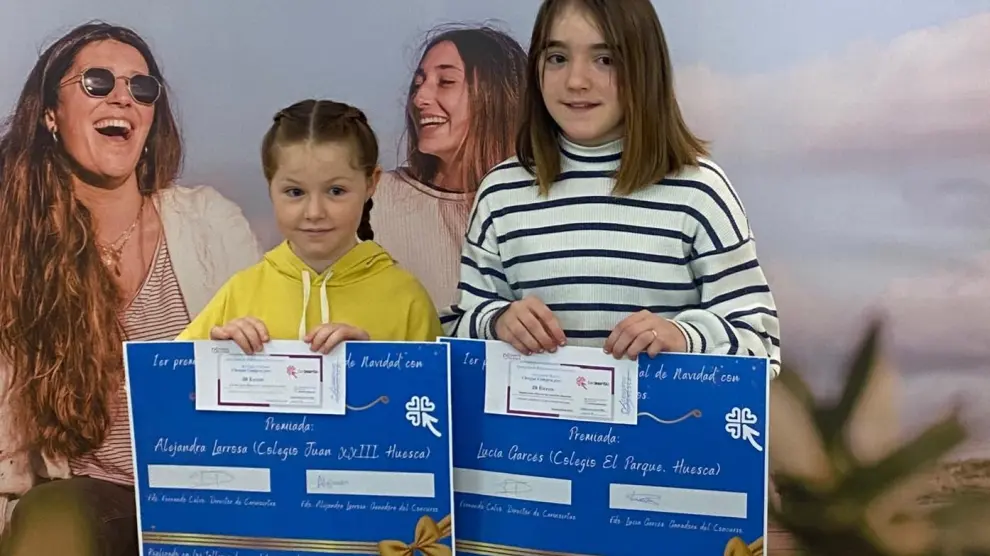Ganadoras del concurso de postales navideñas de Carinsertas de Huesca.