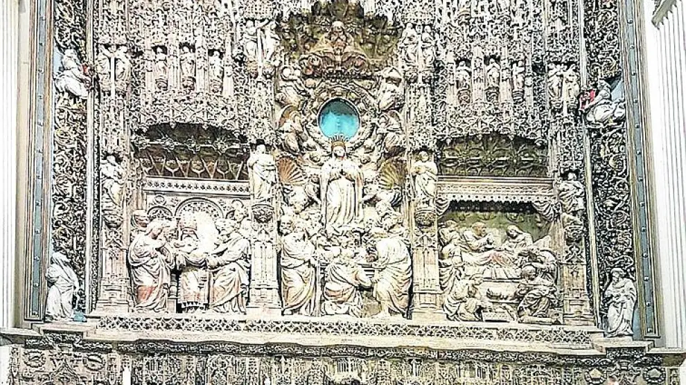 El impresionante retablo de Damián Forment ya puede verse en la basílica del Pilar tras su restauración.