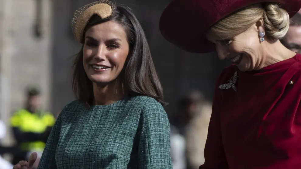 Spain's Queen Letizia and Queen Maxima walk towards the Royal Palace in Amsterdam, Netherlands, Wednesday, April 17, 2024. (AP Photo/Peter Dejong)