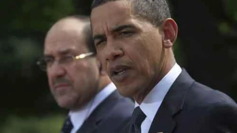 Obama junto al primer ministro iraquí, Nuri al Maliki