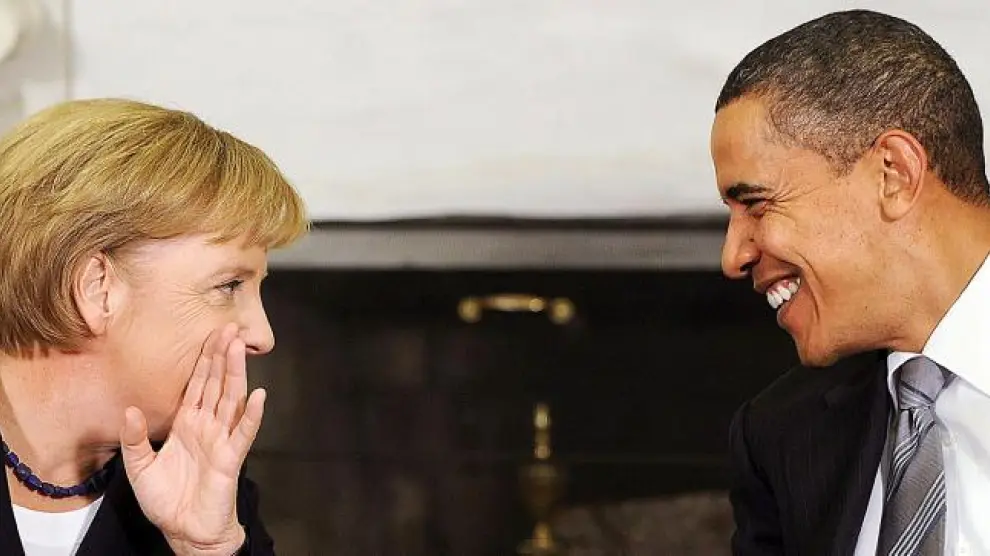 Angela Merkel y Barack Obama conversan en el Despacho Oval de la Casa Blanca, ayer.