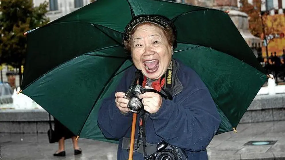 Una japonesa que hacía fotos en la Ofrenda alucina con mis calzones rotos
