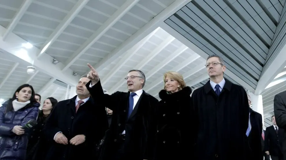 Blanco, Aguirre y Gallardón, en la inauguración en Atocha