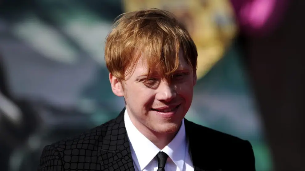 Rupert Grint posa en la alfombra roja de Londres antes del estreno de la última película Harry Potter