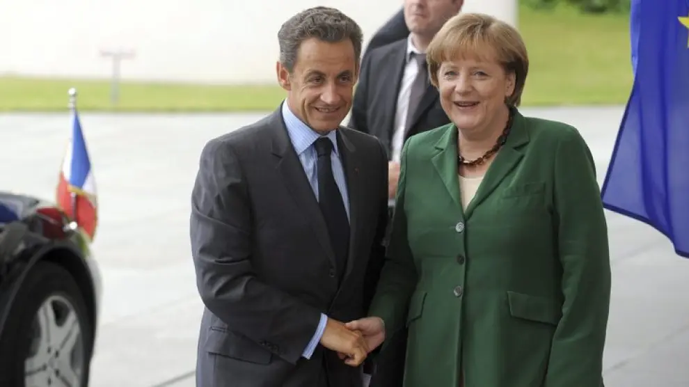 El persidente francés y la canciller alemana en una reunión bilateral por los preparativos de la cumbre de la Eurozona