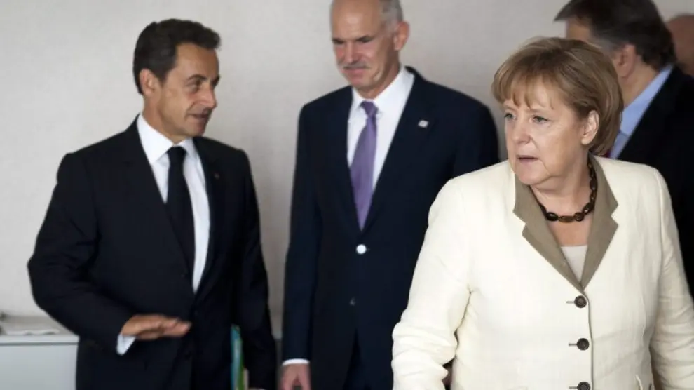 Merkel y Sarkozy durante la cumbre de Bruselas.