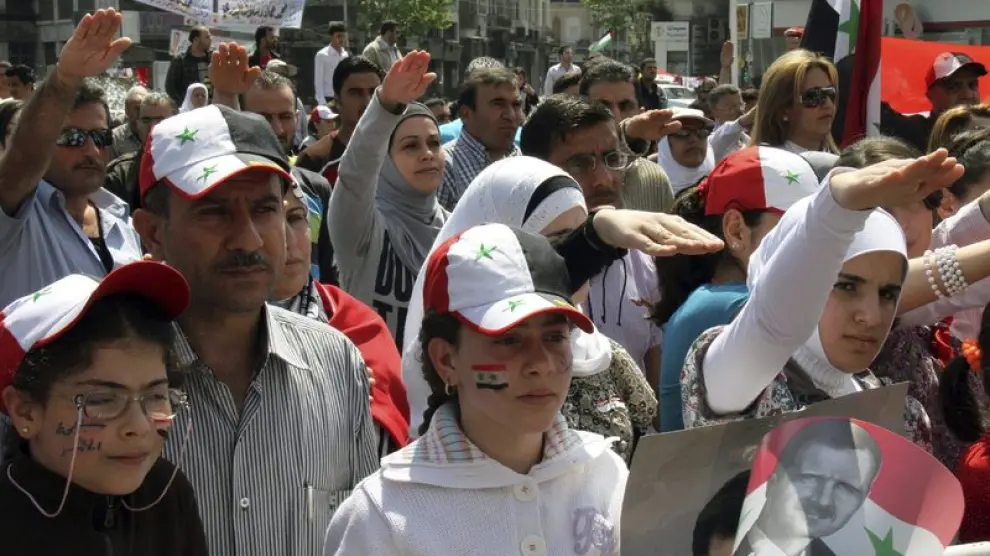 Un grupo de personas apoya al presidente sirio