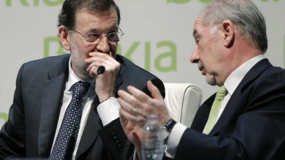 Rajoy y Rato en un encuentro en marzo