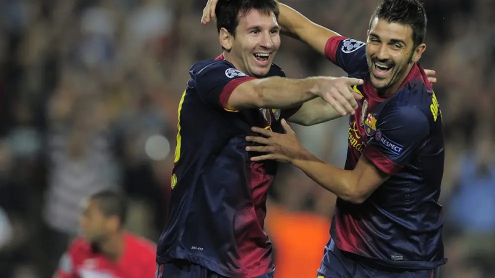 Villa celebra una diana con su compañero Messi