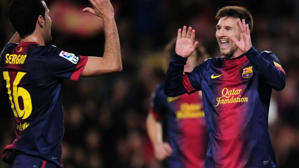 Messi celebra un gol con sus compañeros