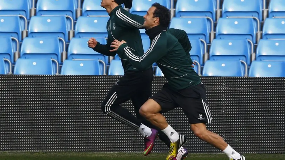 Cristiano Ronaldo y Carvalho, en el entrenamiento de este lunes