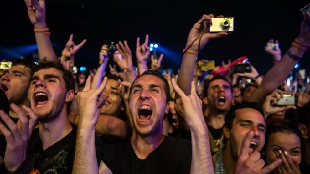 Los fans de la banda americana 'Metallica' durante una de sus actuaciones.