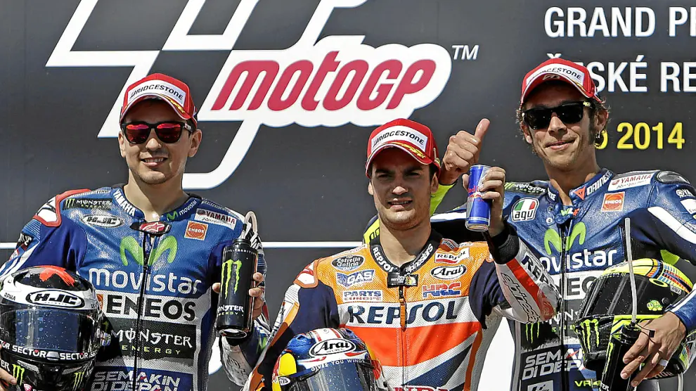 rimer podio de la temporada en el que Márquez no está: Lorenzo (2º), Pedrosa (1º) y Rossi (3º).