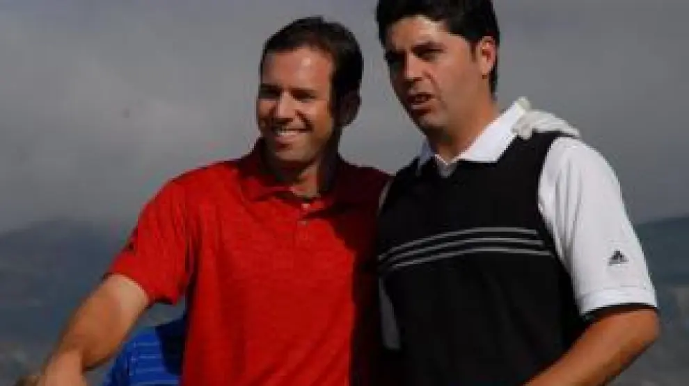 García Sanjuán, junto a Sergio García en una partida de golf.