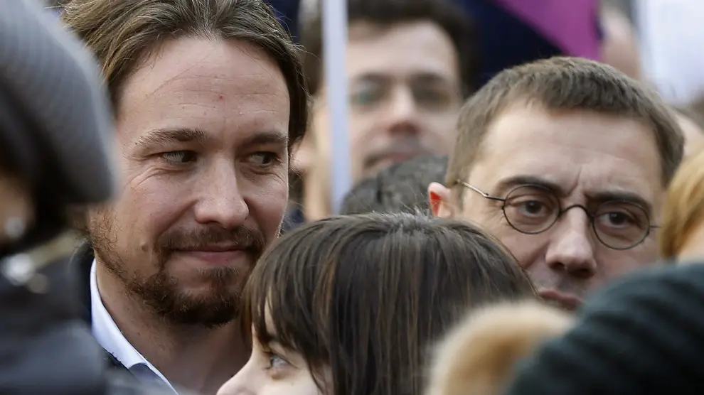 El líder de Podemos, Pablo Iglesias, y el número tres, Juan Carlos Monedero, durante la "marcha del cambio",