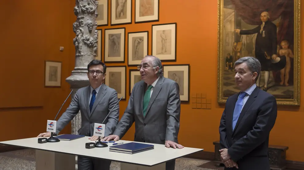 Román Escolano, Amado Franco y Víctor Iglesias, en la firma del acuerdo