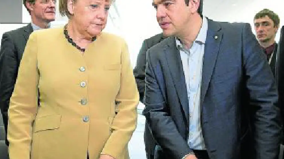 La canciller alemana con el presidente griego el día 22 en Riga.