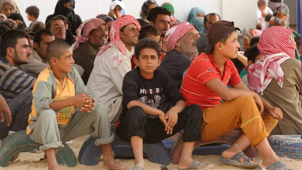 Varios jóvenes refugiados sirios.