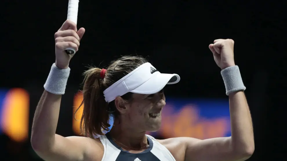 La tenista española Garbiñe Muguruza celebra su triunfo contra la checa Lucie Safarova.
