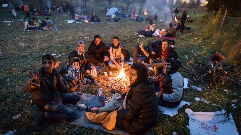 Un grupo de refugiados en la frontera entre Austria y Eslovenia.