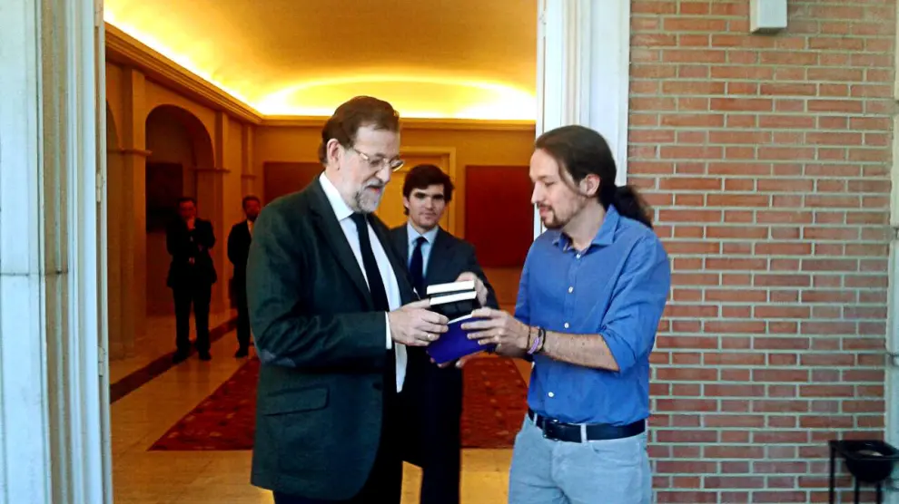 Rajoy e Iglesias a su llegada a la sede de la Presidencia del Gobierno.
