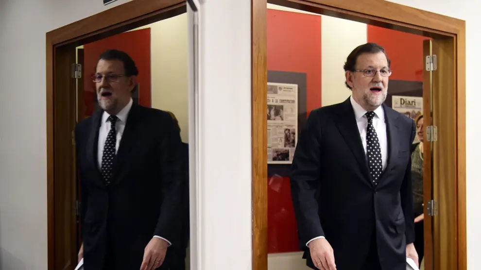 Rajoy, en la puerta de la sala de prensa de La Moncloa