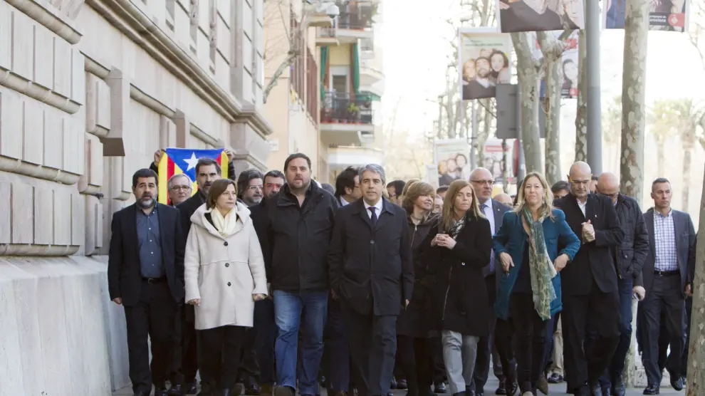 Homs acudió a declarar acompañado por varios políticos catalanes.