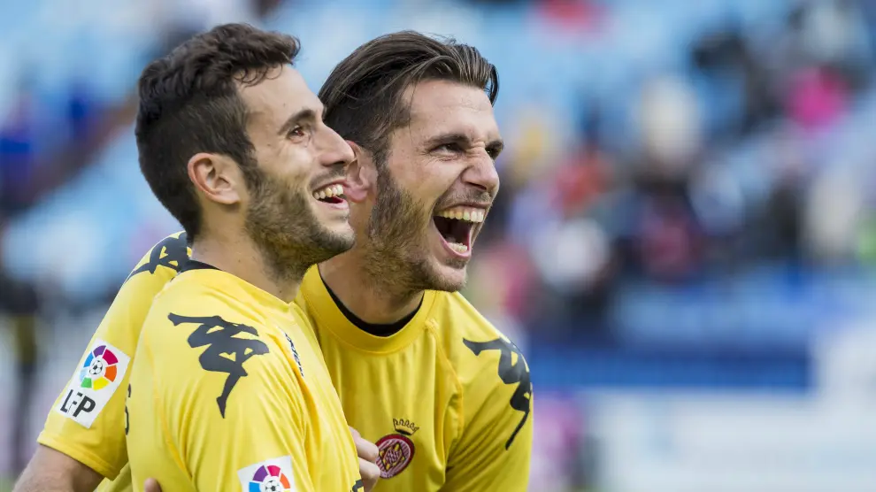Los jugadores del Girona celebran la victoria ante el Real Zaragoza.