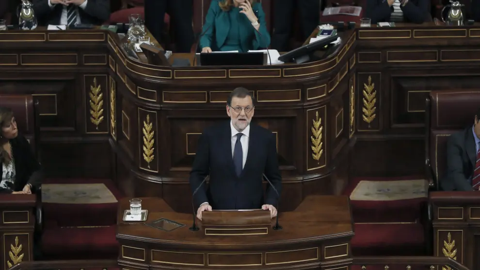 El líder del PP y presidente del Gobierno en funciones, Mariano Rajoy, durante su intervención en el debate de su investidura, esta tarde en la Cámara Baja.