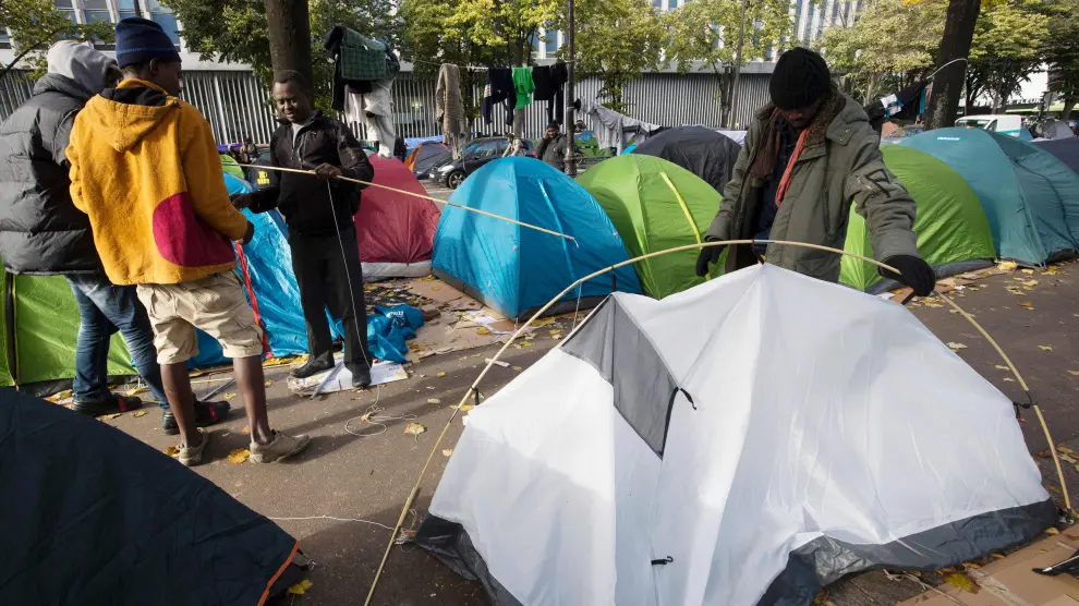 Inmigrantes acampados en París.