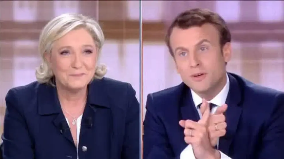 Macron sale reforzado de un acalorado debate electoral frente a Le Pen