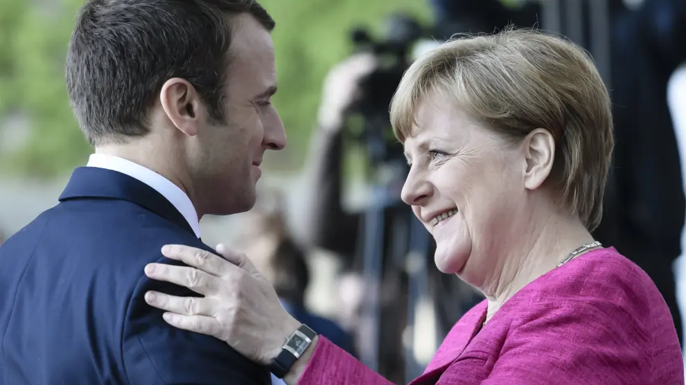 Macron y Merkel en una reunión.