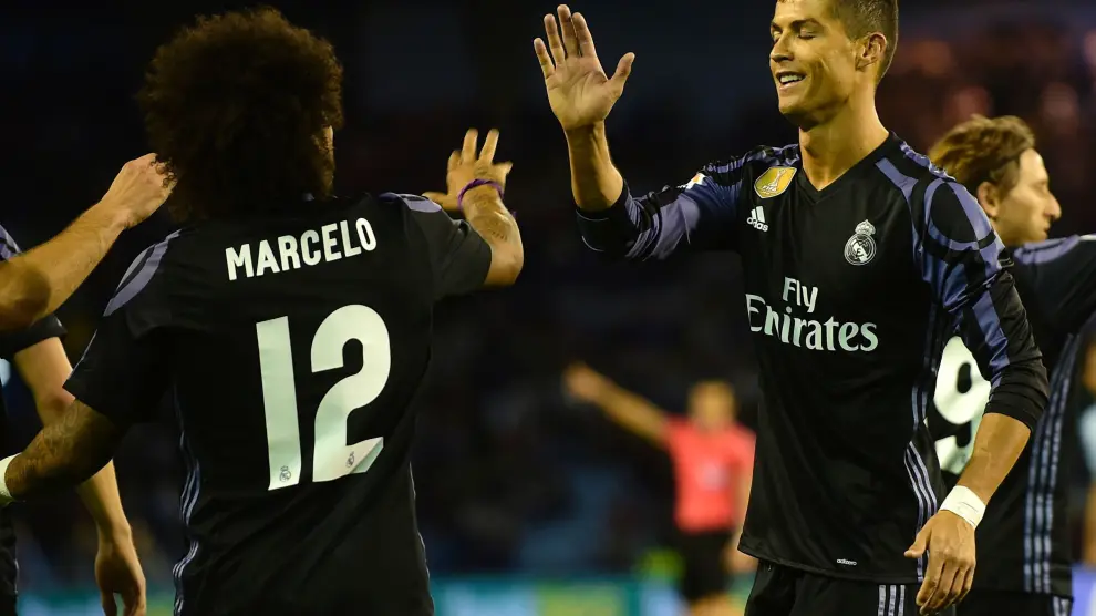 Ronaldo y Marcelo, tras uno de los goles del Madrid.