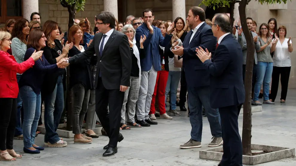 Puigdemont llegando al palacio de la Generalitata este lunes.
