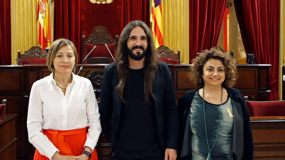 Forcadell junto a Baltasar Picornell, presidente del Parlament Balear y Joana Aina Campomar.