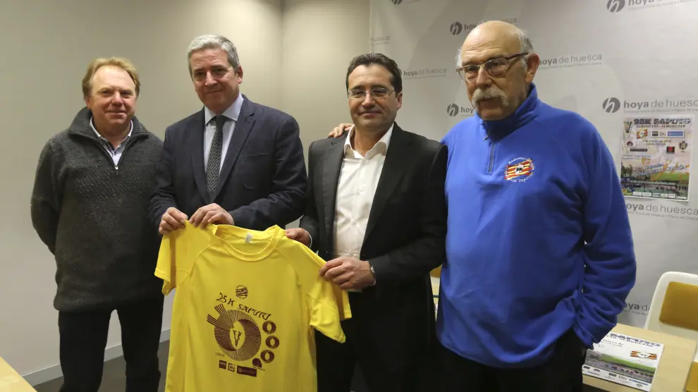 Luis Abad, Enrique Mored, Jesús Alfaro y Roberto Iglesias durante el acto de presentación que ha tenido lugar este viernes en Huesca.
