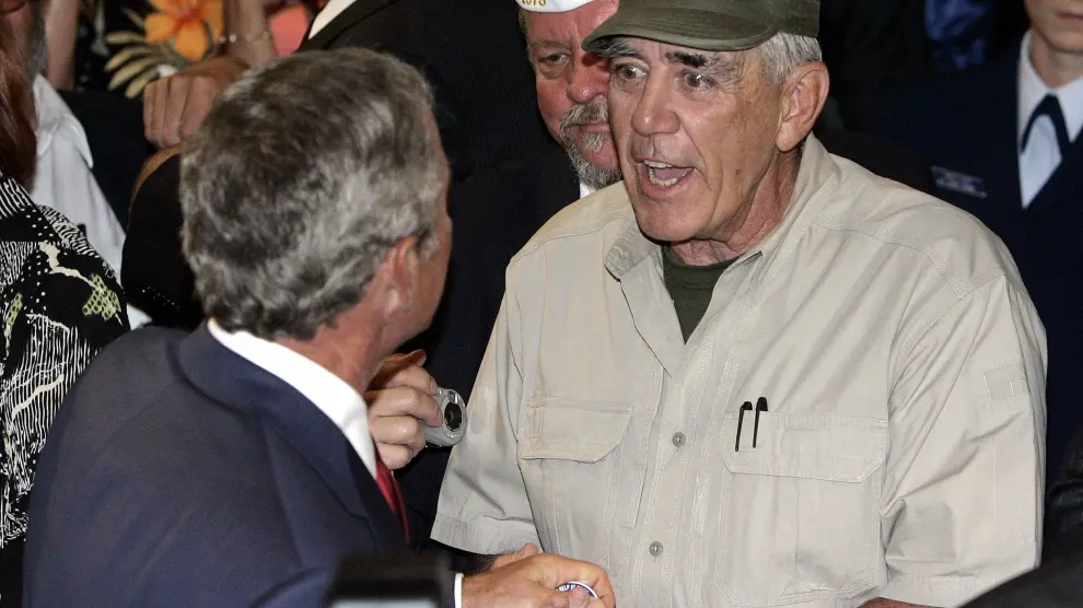 El actor, en un encuentro con el expresidente George Bush.
