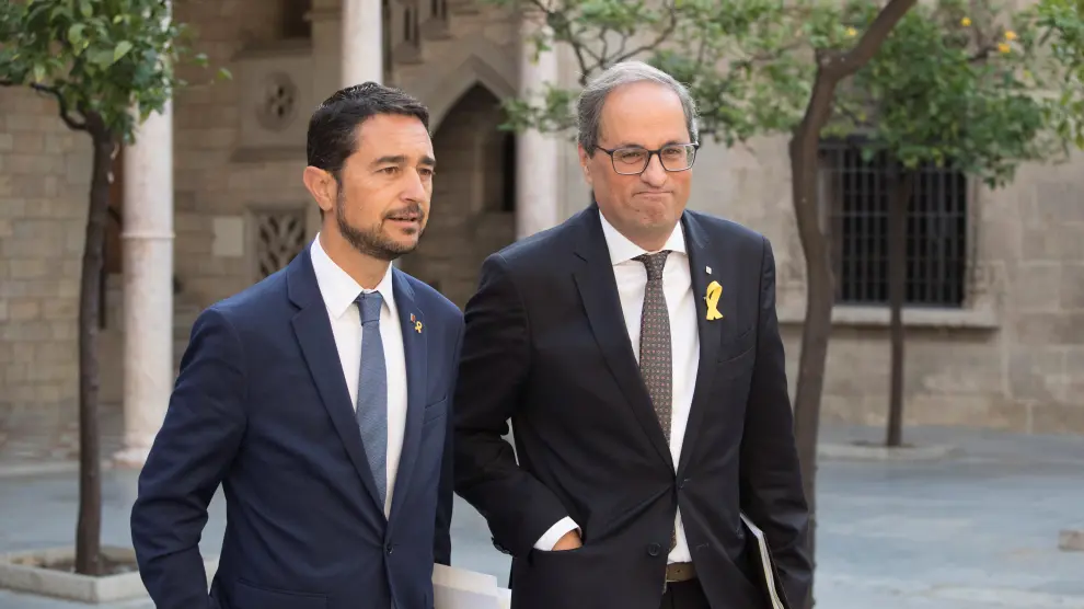 Damià Calvet y Quim Torra este miércoles a su llegada al Palau de la Generalitat