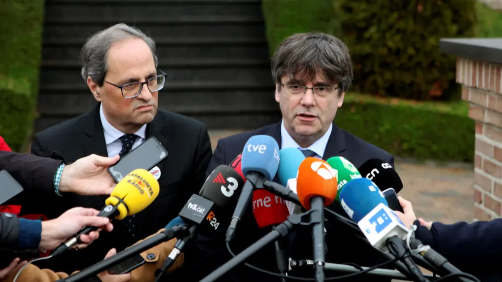 El expresidente de la Generalitat, Carles Puigdemont, junto al presidente de la Generalitat, Quim Torra.