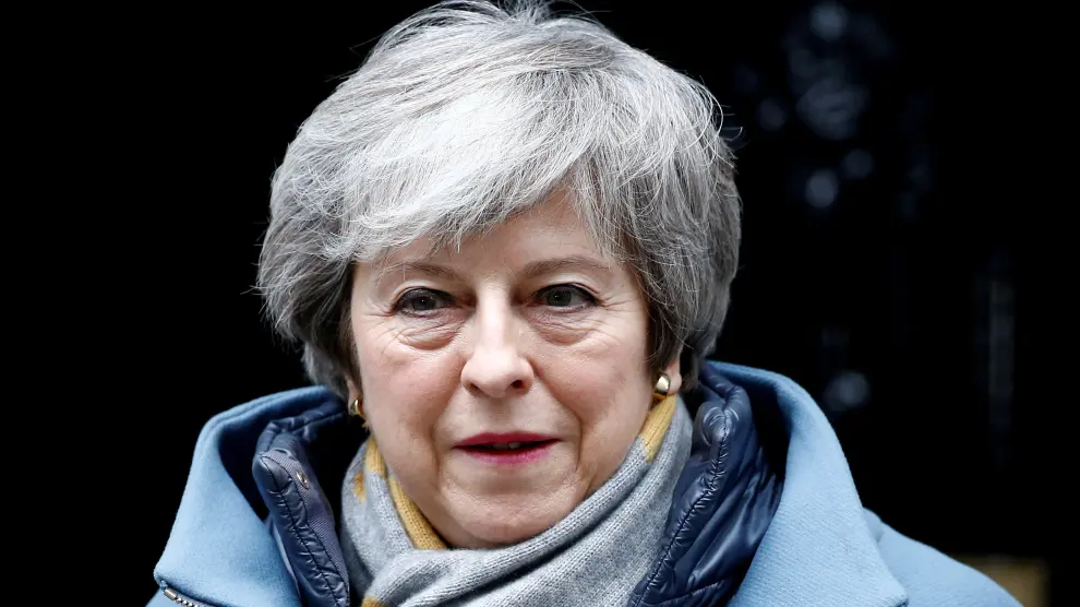 FILE PHOTO: British Prime Minister Theresa May walks outside Downing Street, as she faces a vote on Brexit, in London, Britain March 13, 2019. REUTERS/Henry Nicholls/File Photo [[[REUTERS VOCENTO]]] BRITAIN-EU/