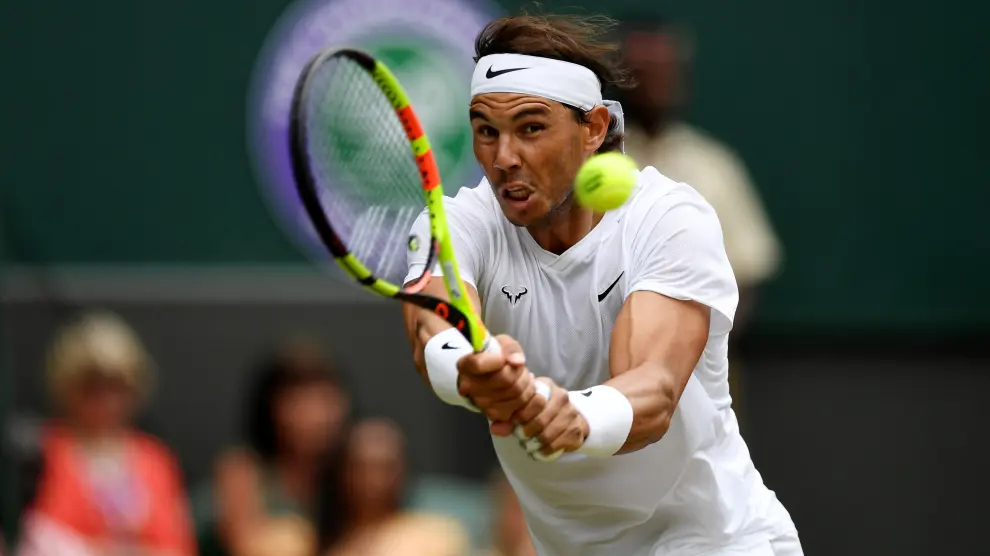 Tennis - Wimbledon - All England Lawn Tennis and Croquet Club, London, Britain - July 6, 2019  Spain's Rafael Nadal reacts during his third round match against France's Jo-Wilfried Tsonga  REUTERS/Tony O'Brien [[[REUTERS VOCENTO]]] TENNIS-WIMBLEDON/