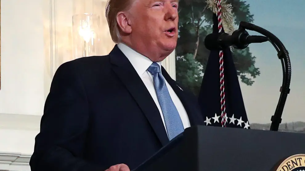 U.S. President Donald Trump speaks about the shootings in El Paso and Daytonin the Diplomatic Room of the White House in Washington, U.S., August 5, 2019. REUTERS/Leah Millis [[[REUTERS VOCENTO]]] USA-SHOOTING/TRUMP
