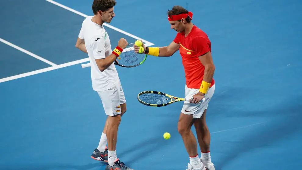 Rafa Nadal y Pablo Carreño, en su partido contra Bélgica.