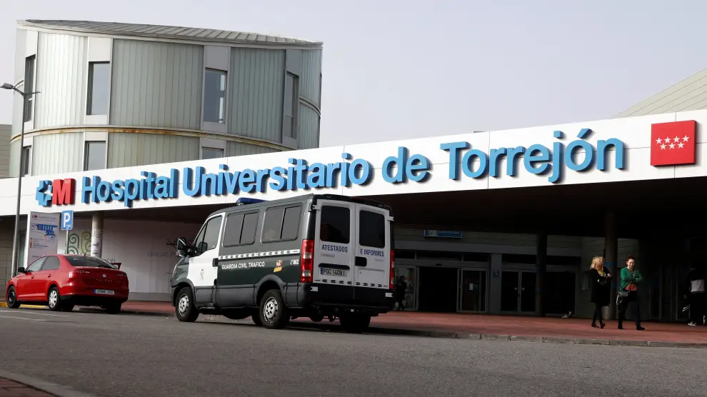 A Spanish civil guard van is seen outside Torrejon University Hospital after two coronavirus cases were identified in Torrejon de Ardoz